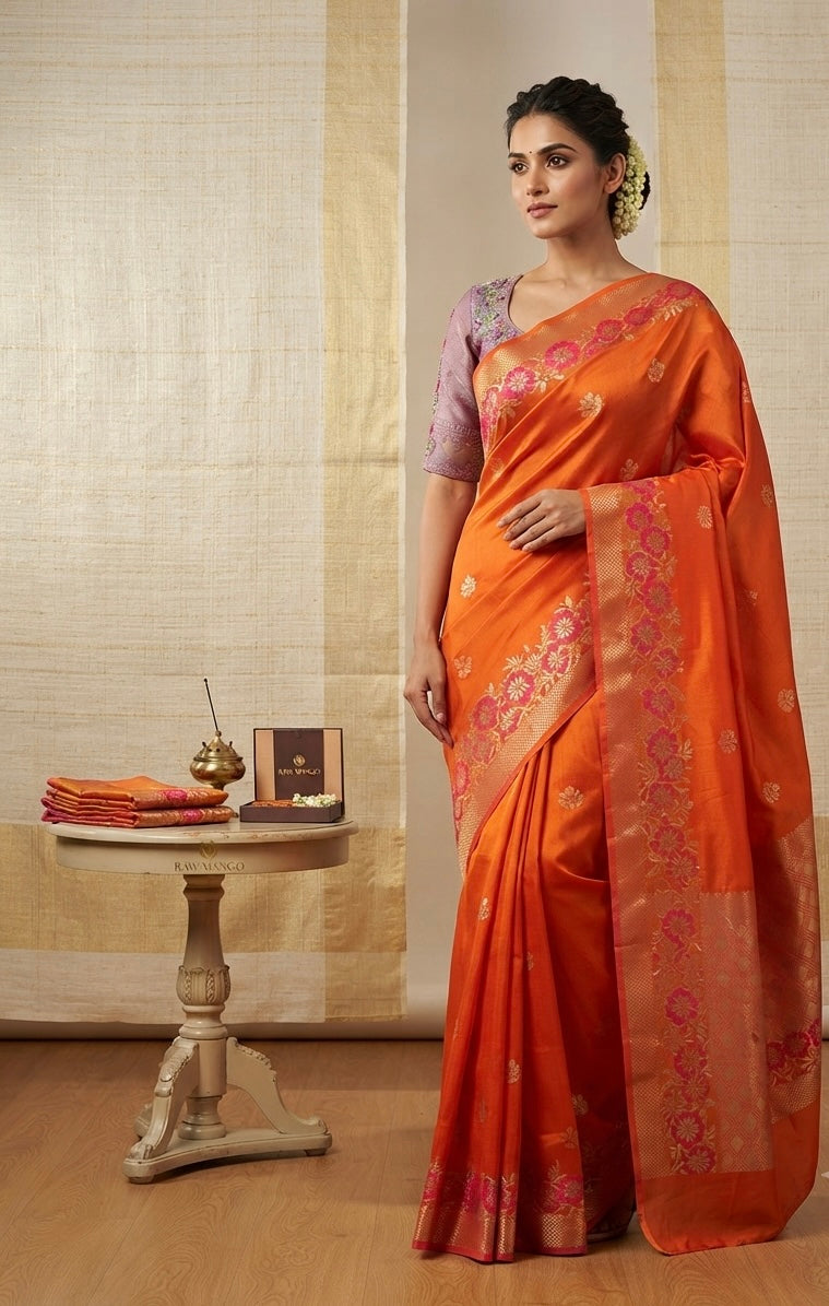 Raw Mango Tangerine Orange Handloom Silk Saree featuring Fuchsia Floral Vine Borders