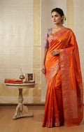 Raw Mango Tangerine Orange Handloom Silk Saree featuring Fuchsia Floral Vine Borders