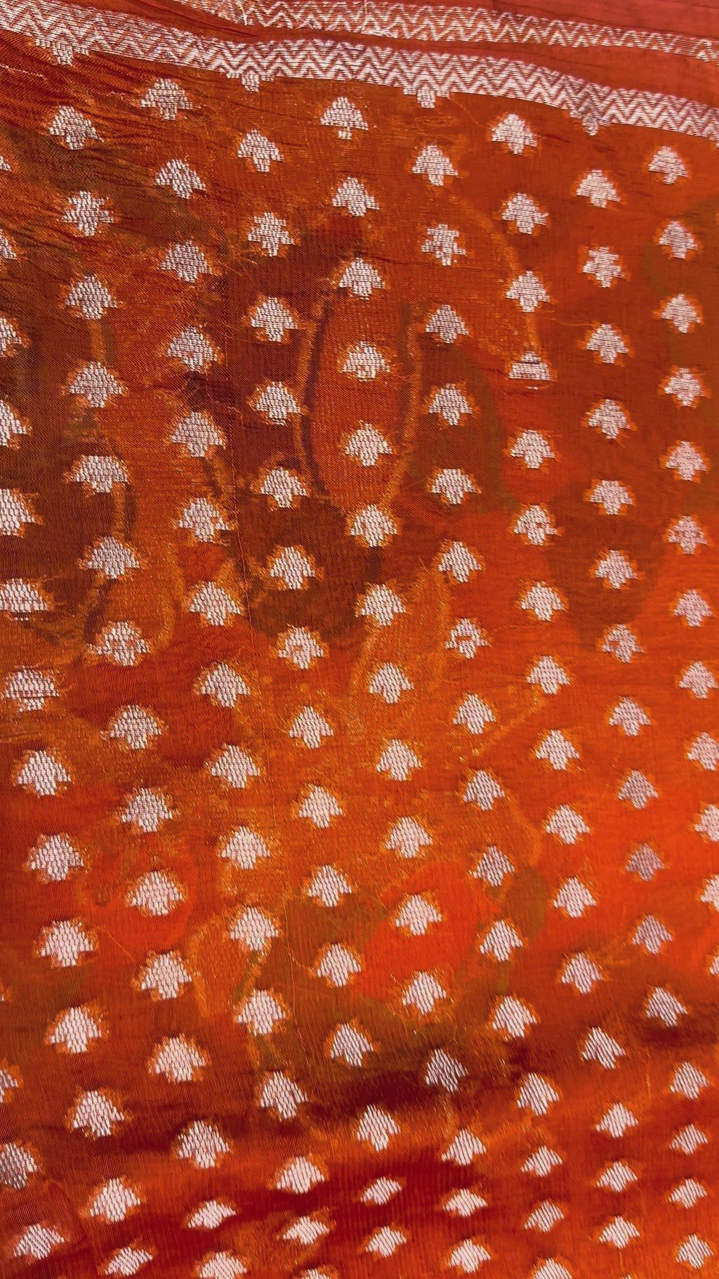 The Aviary Meadow: Vibrant Orange Paper Silk Saree with Pastel Meenakari Birds