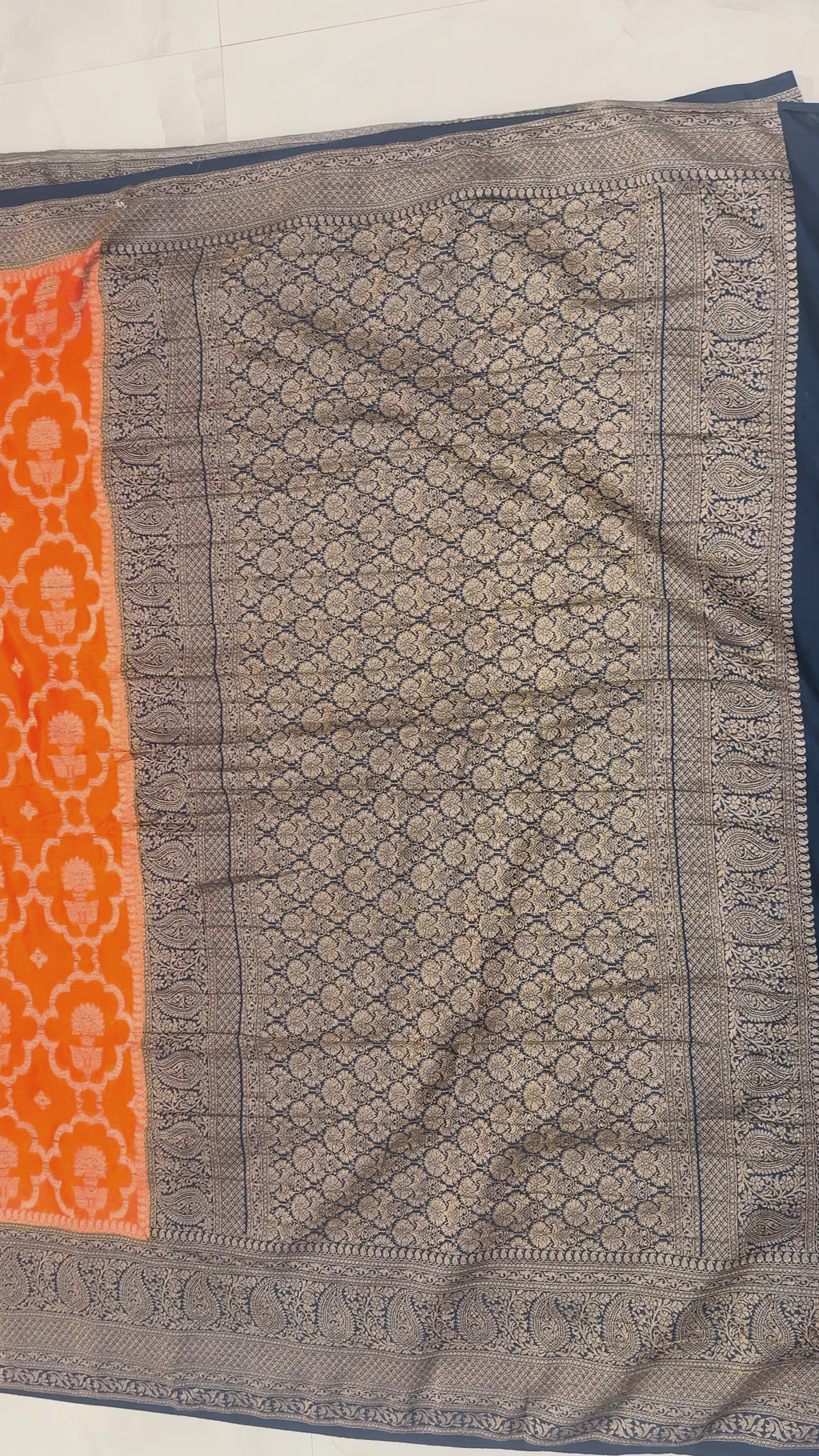 Rust Orange Banarasi Georgette Saree with Antique Zari Floral Jaal and Navy Contrast Border