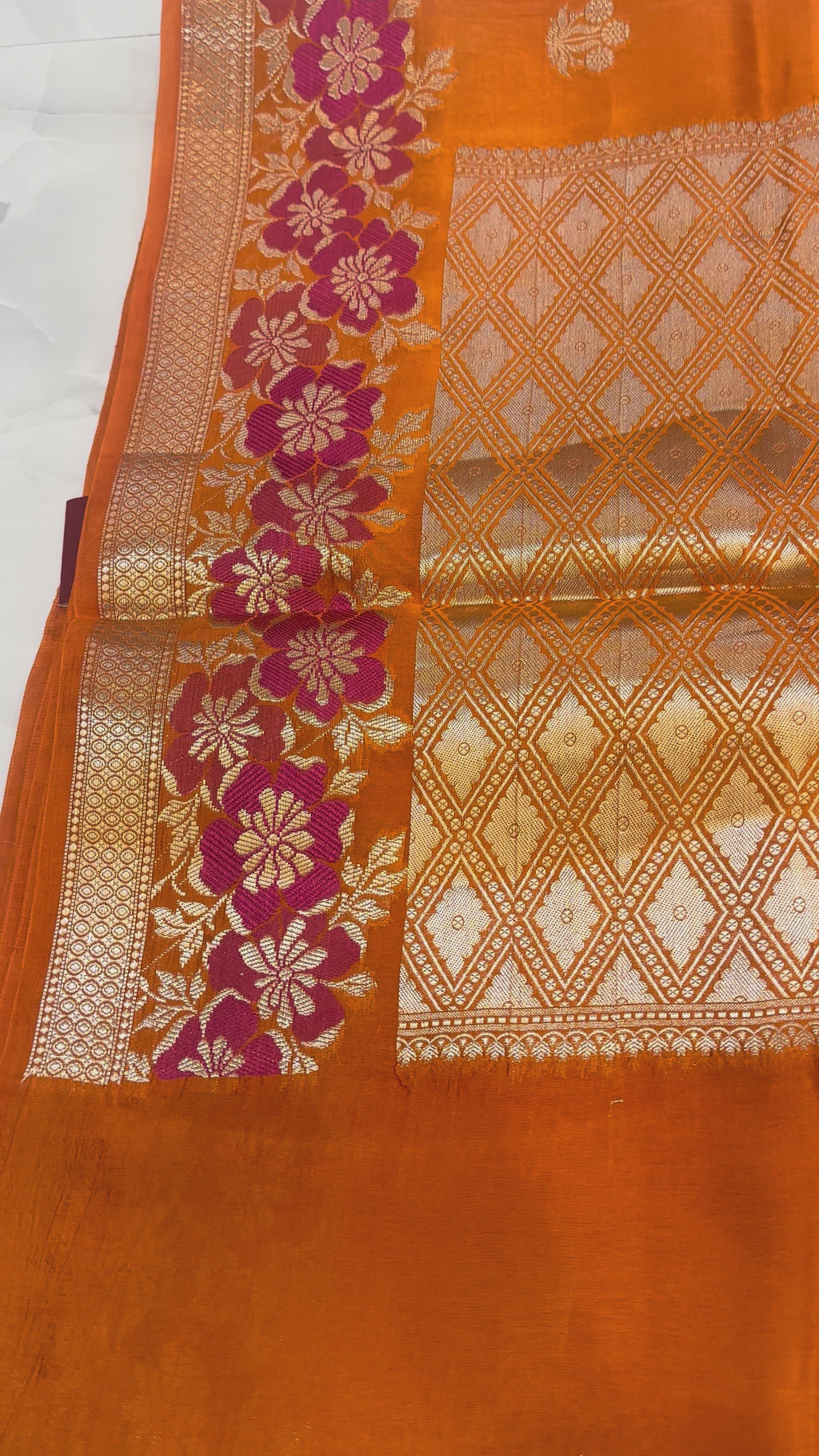 Raw Mango Tangerine Orange Handloom Silk Saree featuring Fuchsia Floral Vine Borders