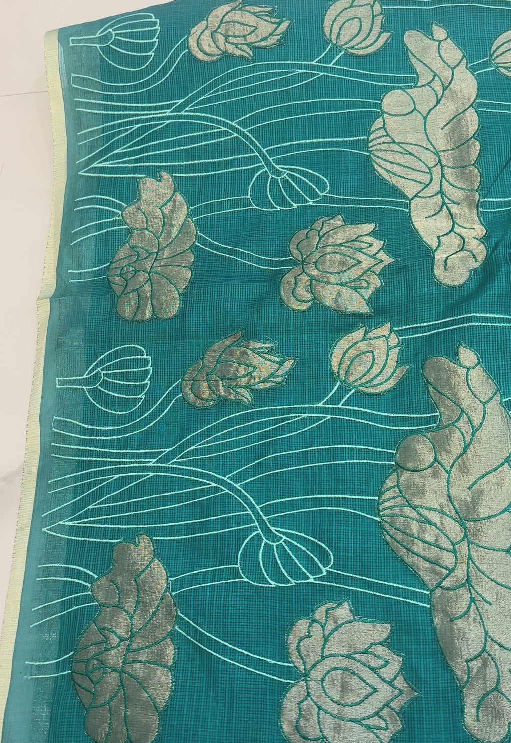 The Lotus Pond: Deep Teal Kota Silk Saree with Antique Gold Botanical Art