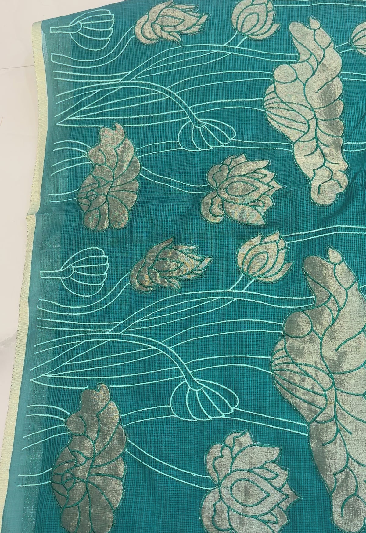 The Lotus Pond: Deep Teal Kota Silk Saree with Antique Gold Botanical Art