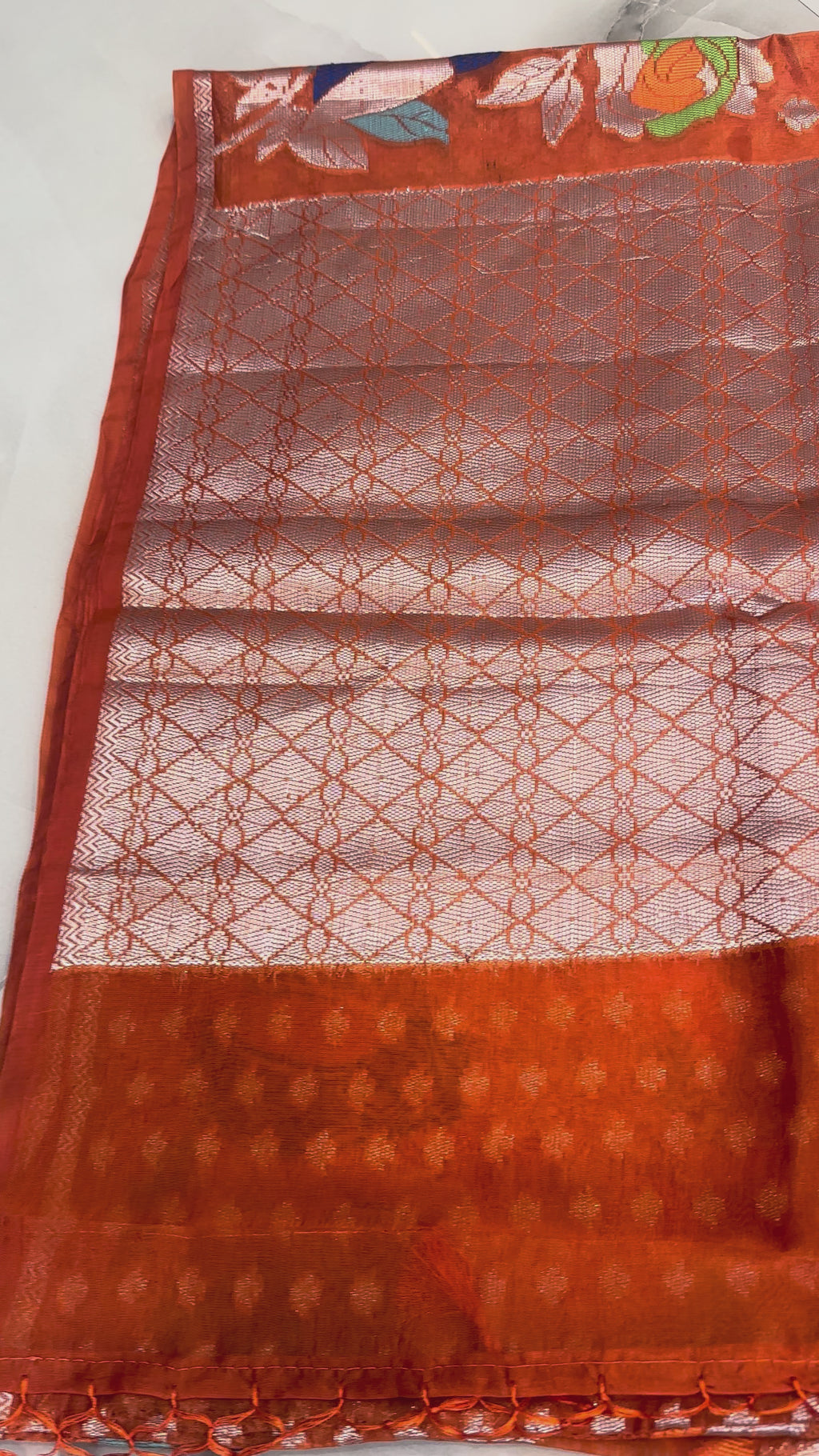The Aviary Meadow: Vibrant Orange Paper Silk Saree with Pastel Meenakari Birds